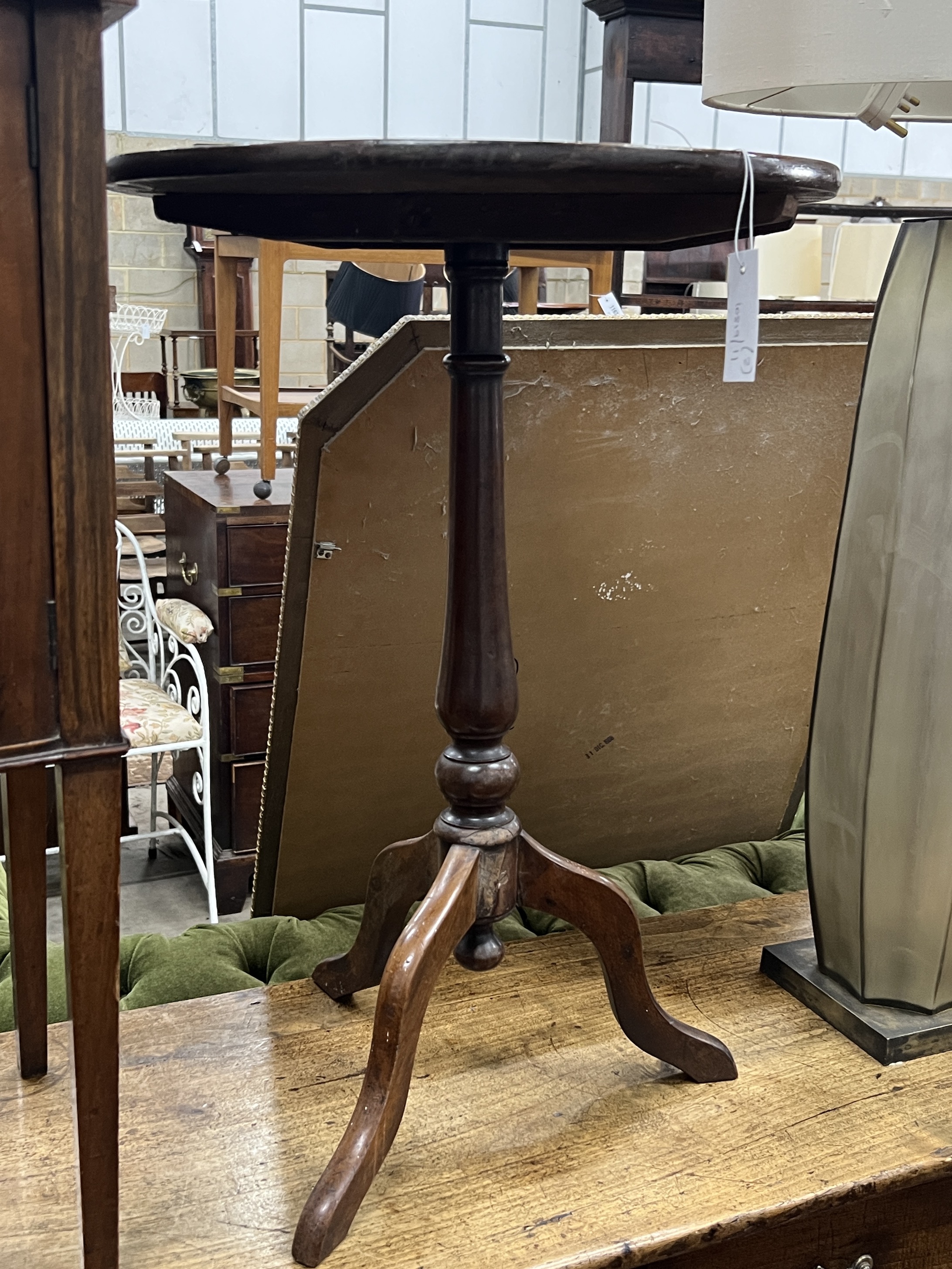 An Edwardian mahogany bow front bedside cabinet, width 40cm, height 82cm together with a Victorian circular wine table